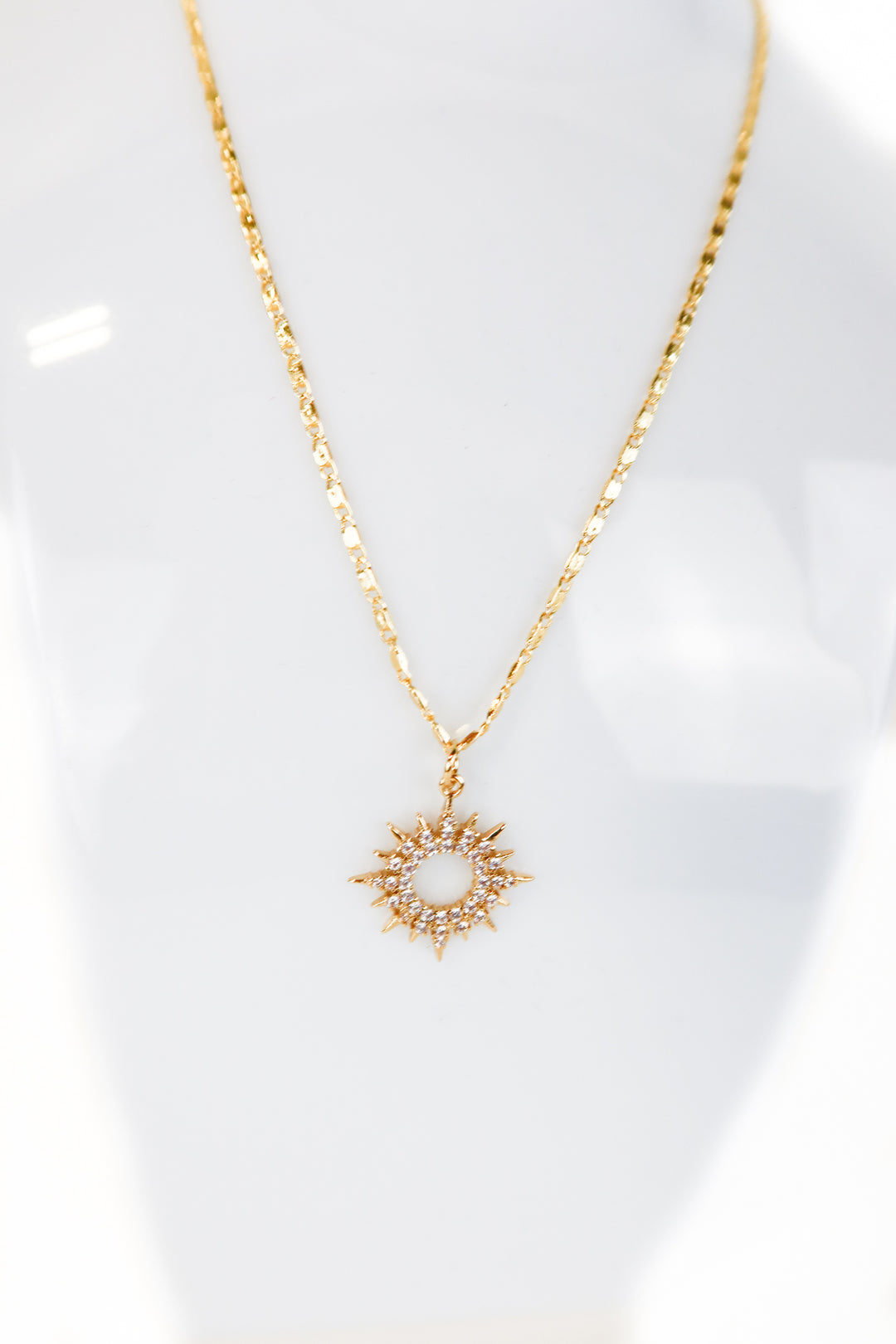 gold/crystal sun necklace