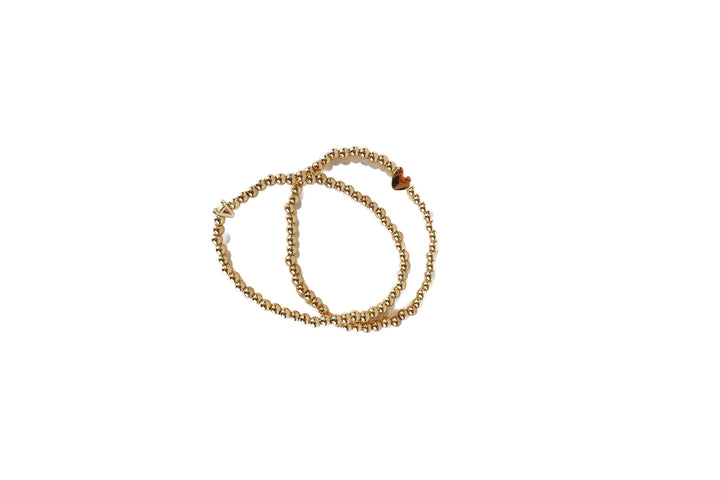 gold beaded A and heart bracelet set