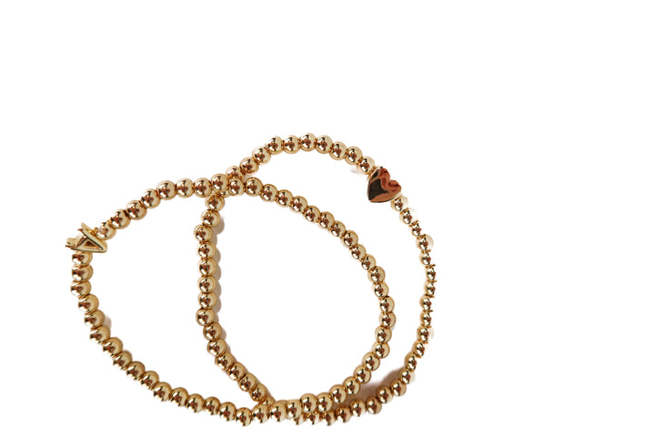 gold beaded A and heart bracelet set