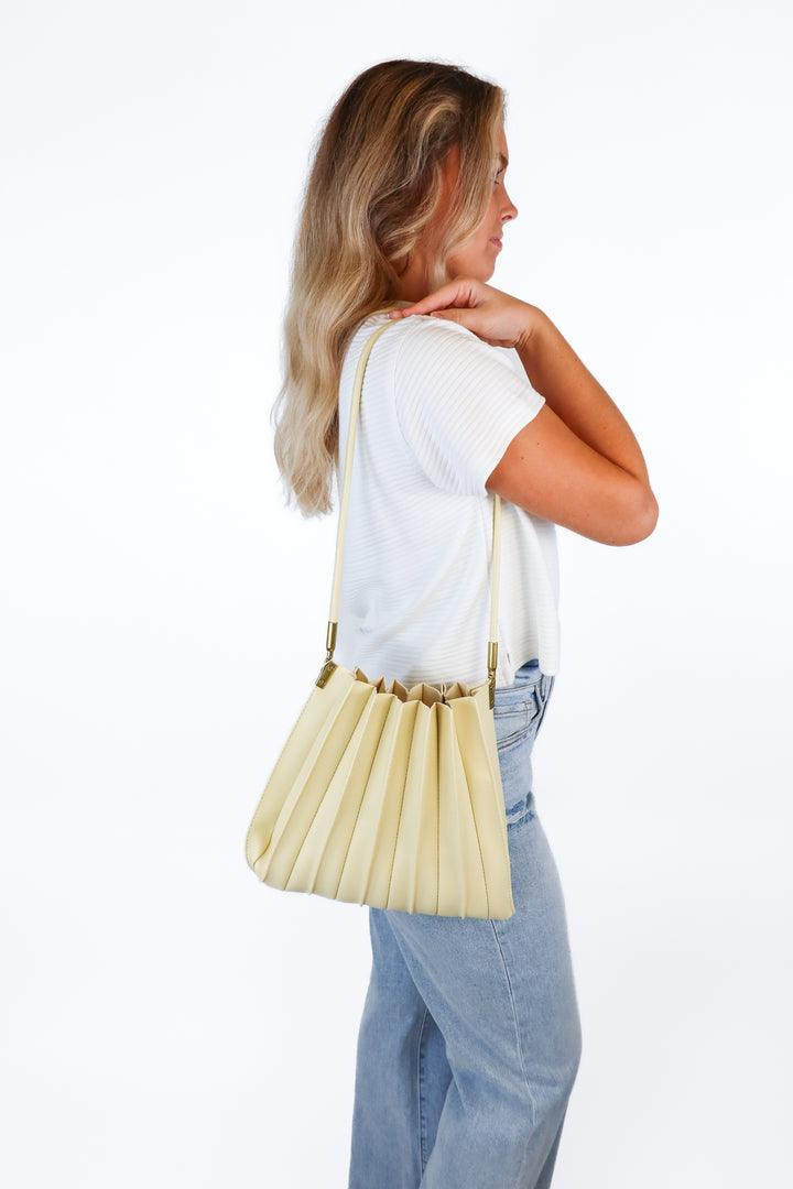 Melie bianco yellow pleated bag NWT; retails for $120