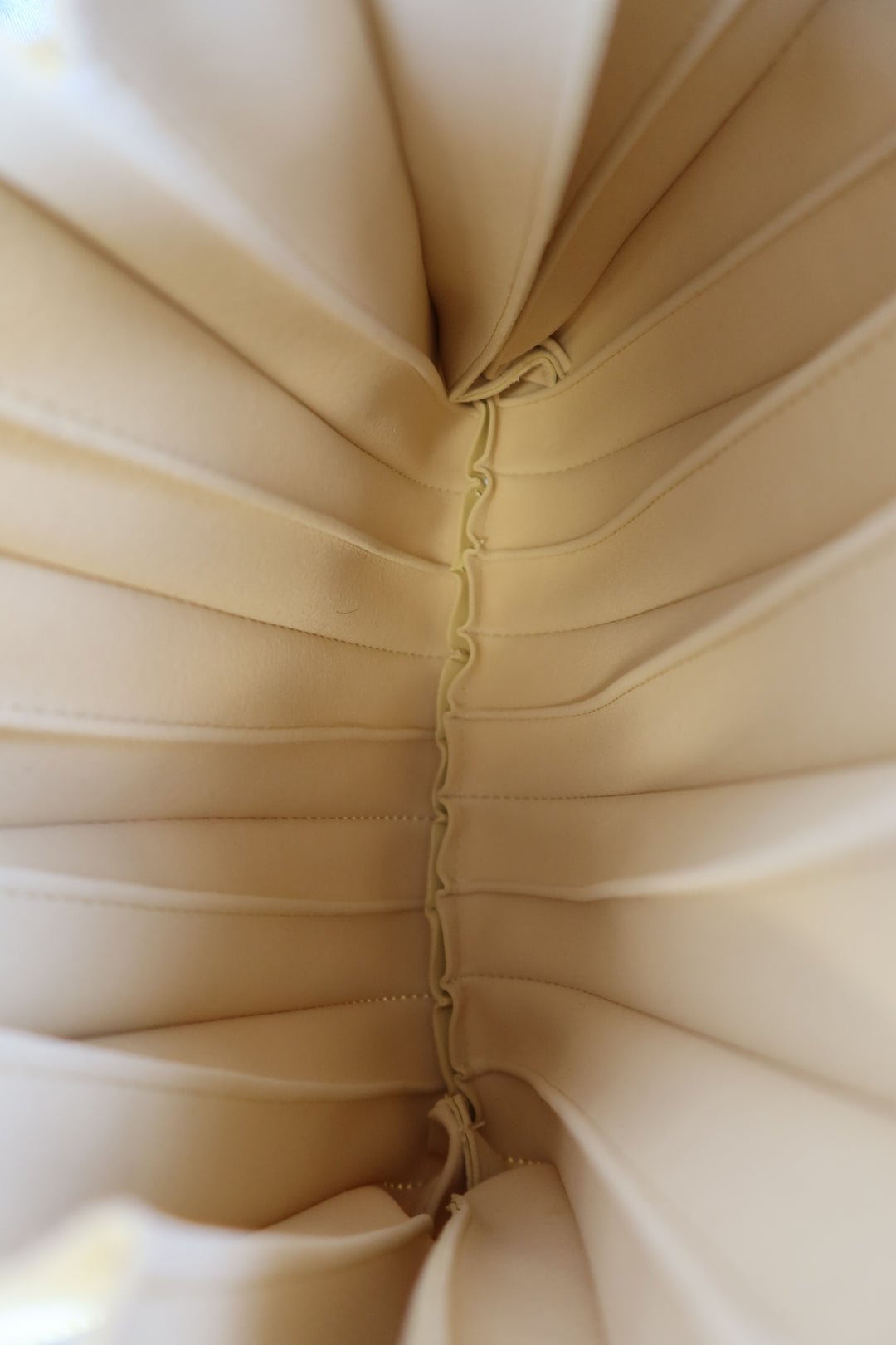Melie bianco yellow pleated bag NWT; retails for $120