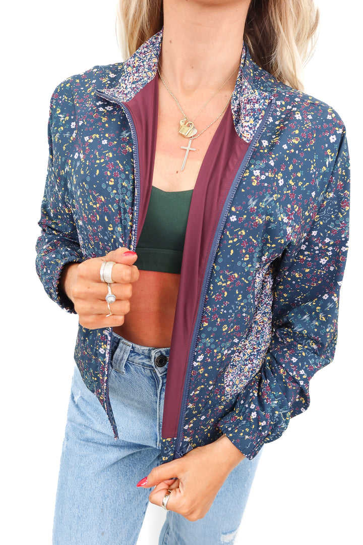 travis mathew floral zip up jacket (s; retail $138)