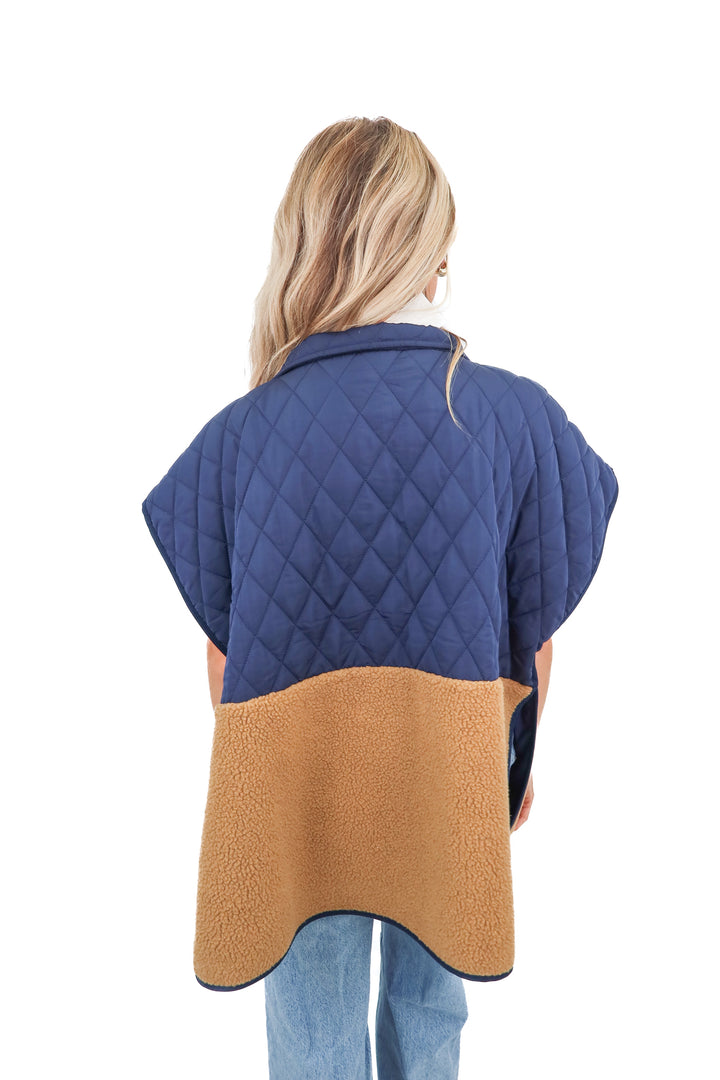 Ann Taylor navy puffer vest (XS/S; retail $129)