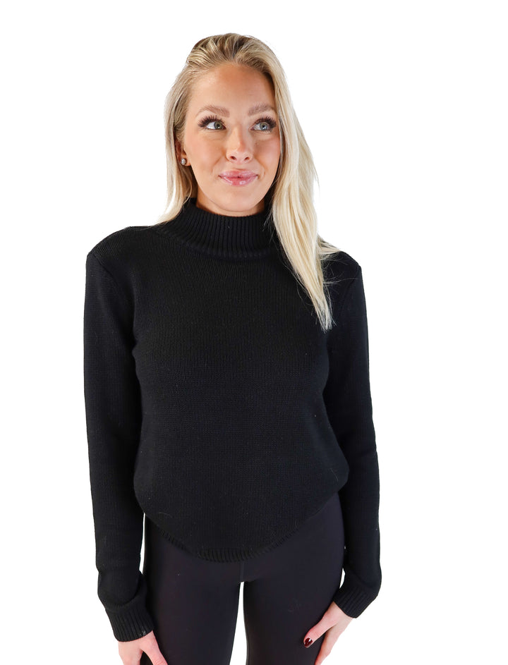 NBD black turtleneck open back sweater (s; retails for $168)