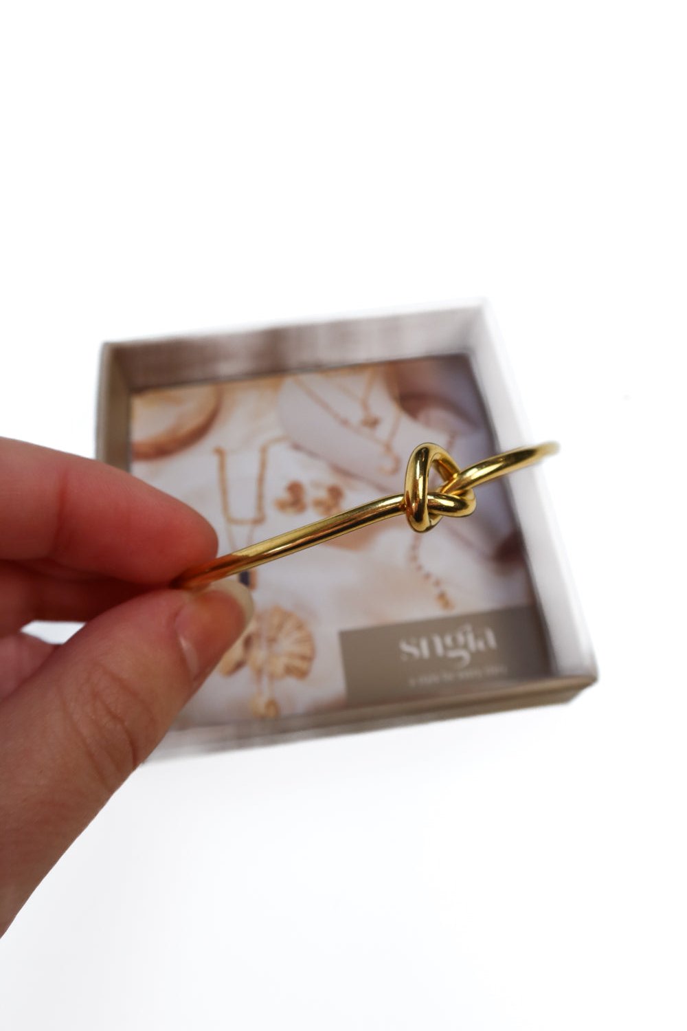 Sngia gold knot bracelet (retails $25)