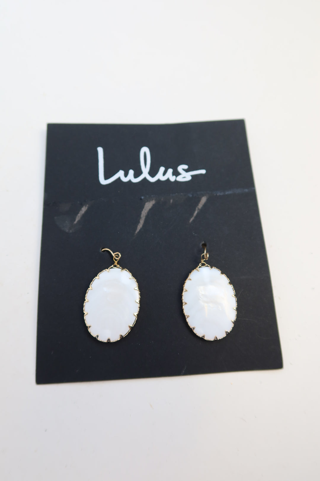 Lulus white stone pendant earrings