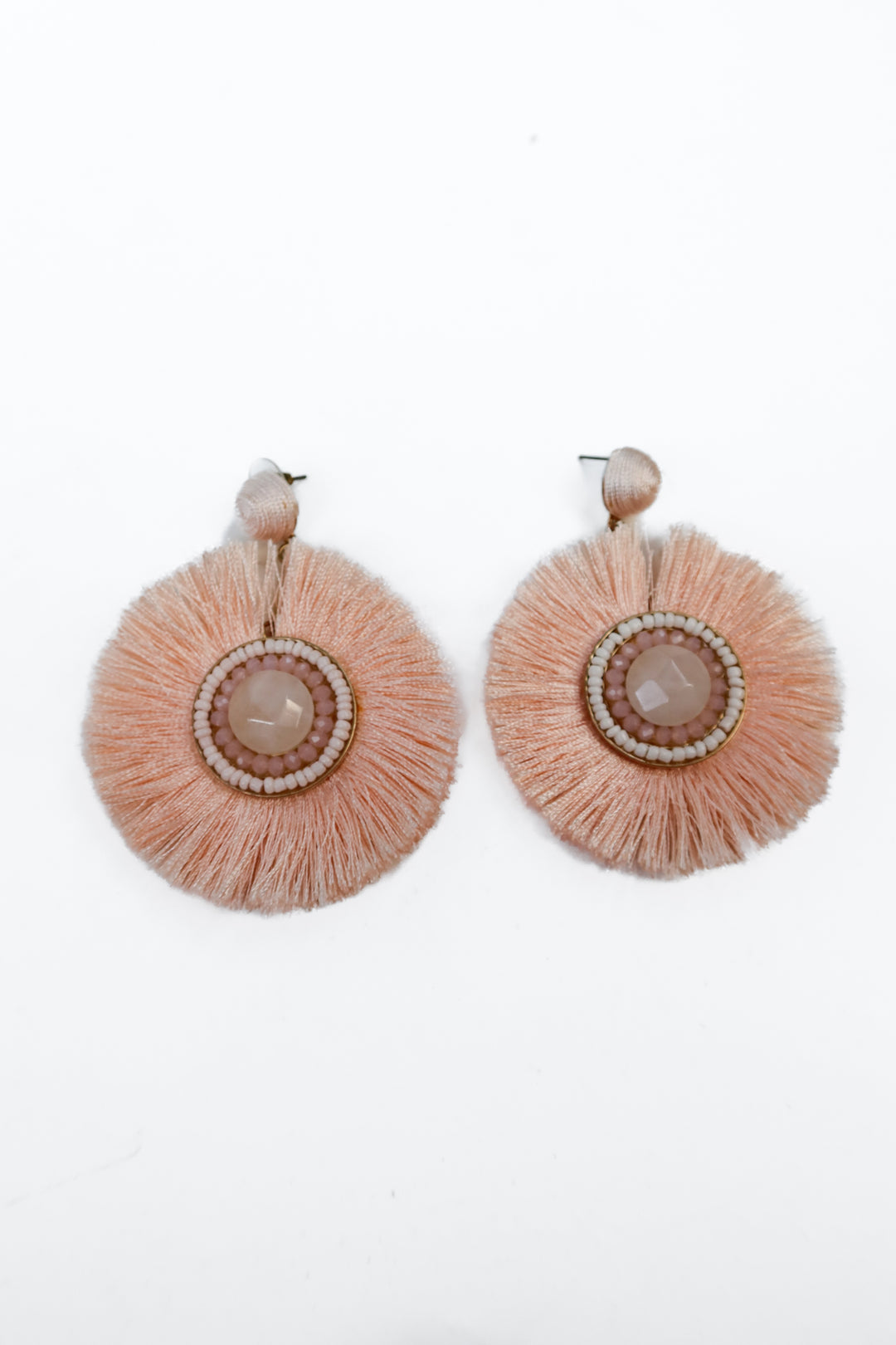 Pink large tassel earrings with gem detail