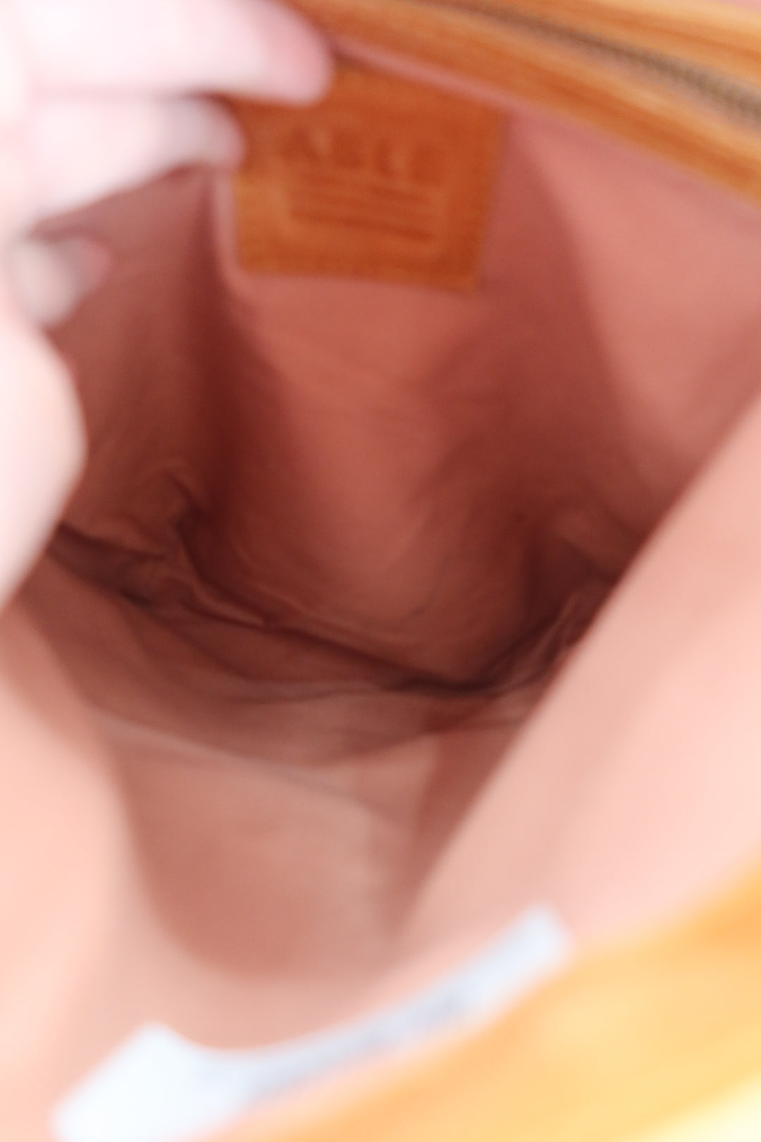 able caramel brown leather backpack