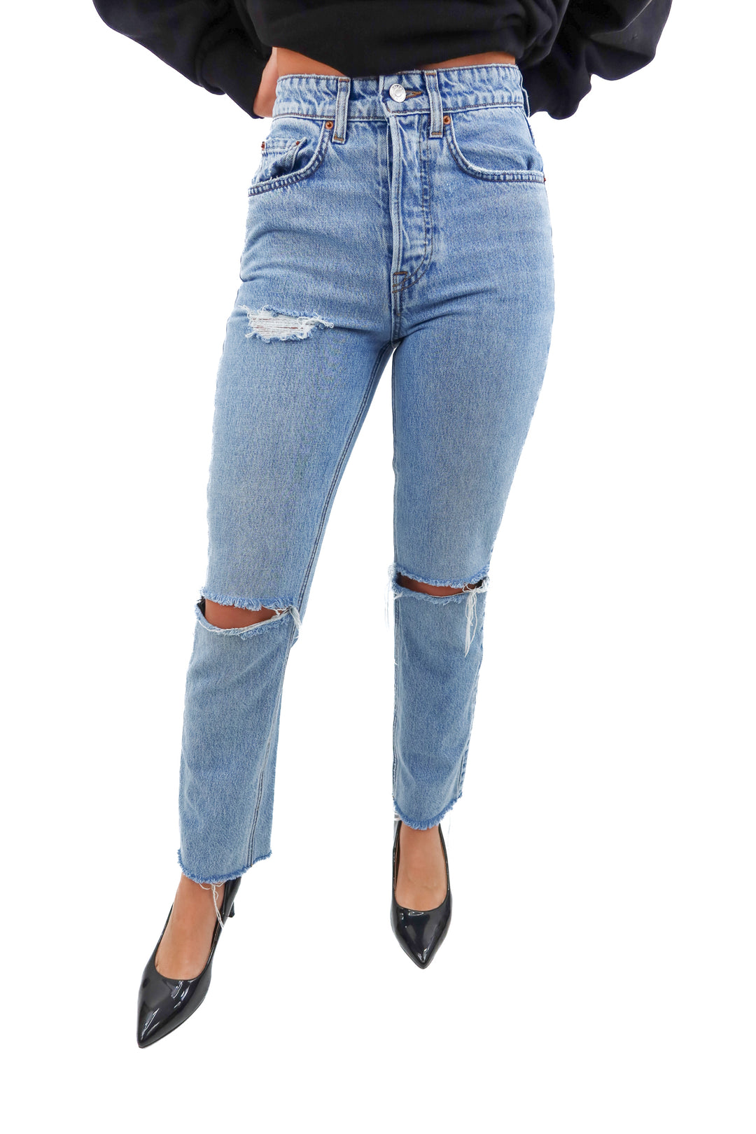 grlfrnd light wash distressed jeans (25; retail $259)