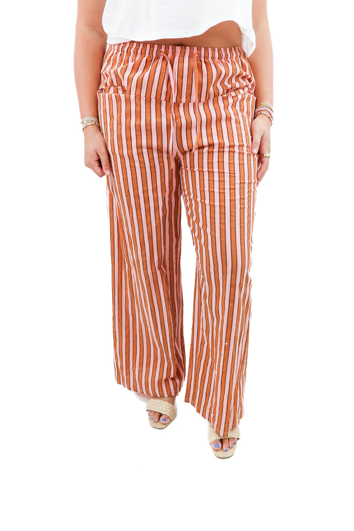 burnt orange and pink striped pants (l)