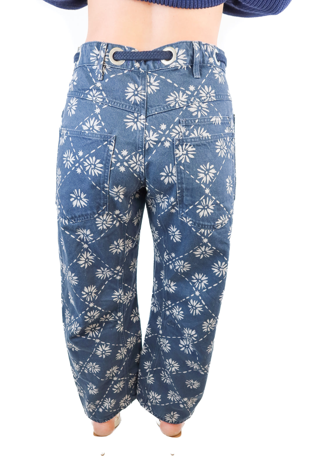 Free People blue denim floral jeans (27; retail $128)