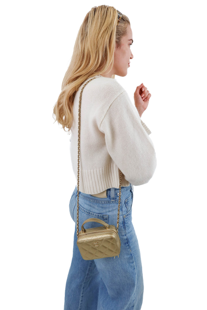 Chanel Metallic Quilted Lambskin Mini Vanity Purse (est. retail $5,400)