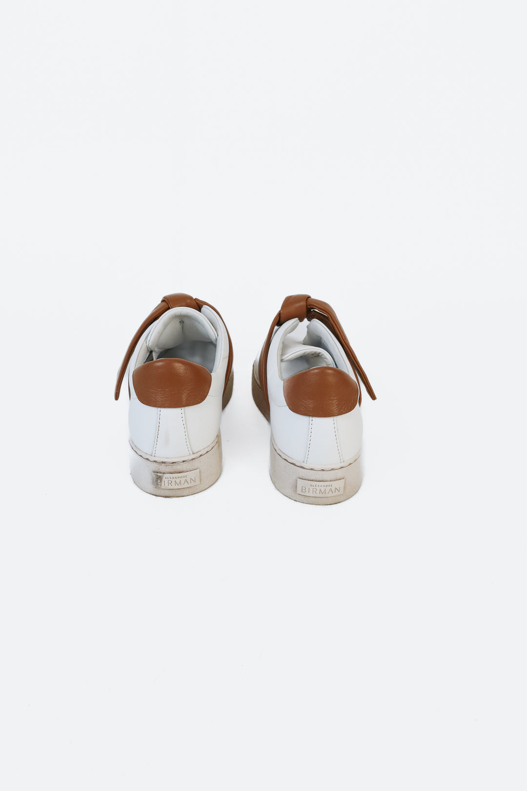Alexandre Birman Leather Asymmetric Bow Sneakers (39; retails $450)