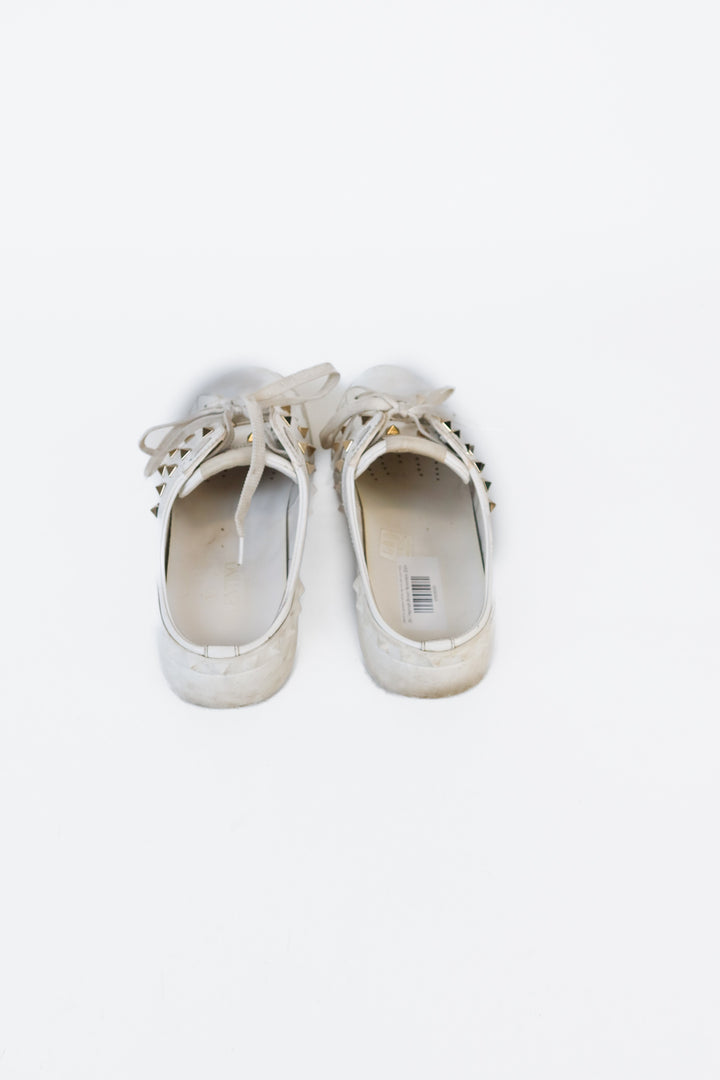 Valentino garavani white slip ons with gold detail (39; retail $980)