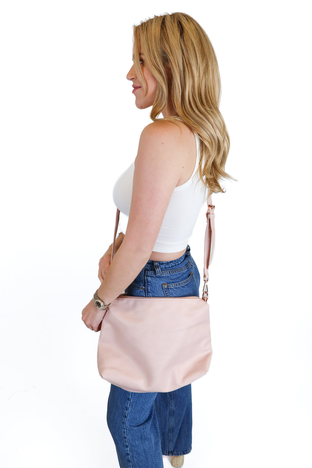 iFly light pink crossbody purse