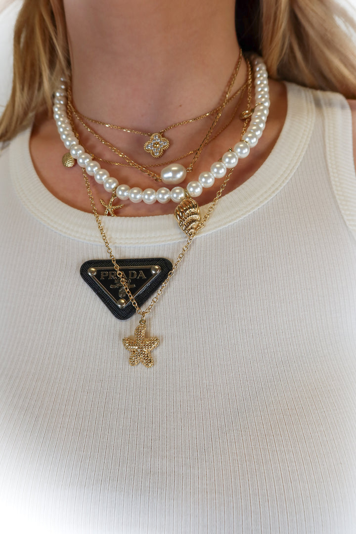 gold and pearl layered necklace