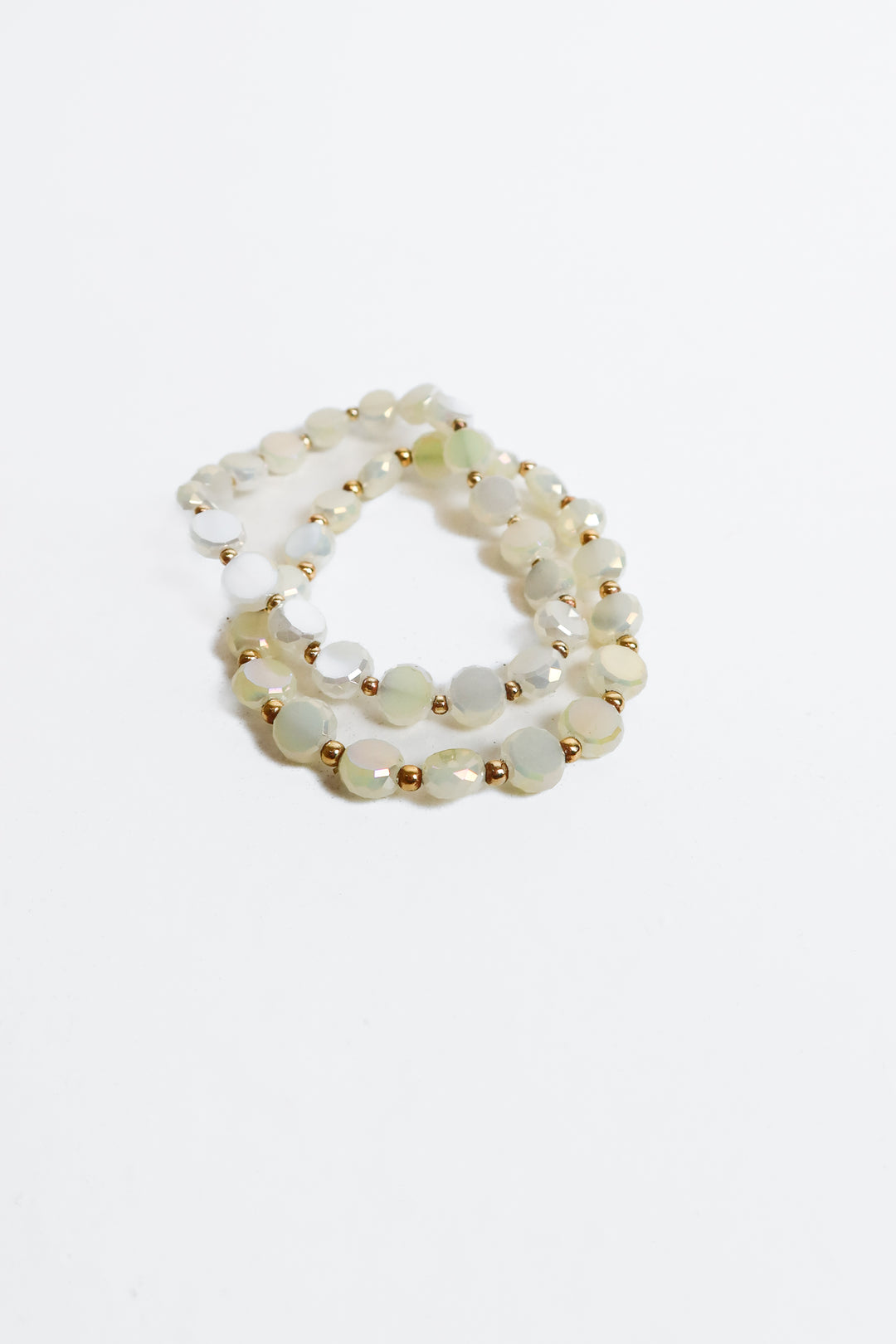 2 iridescent green and gold beaded bracelets