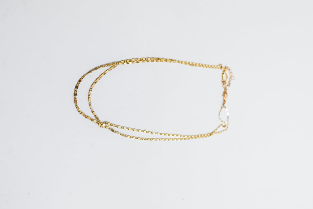 gold stacked figaro link chain