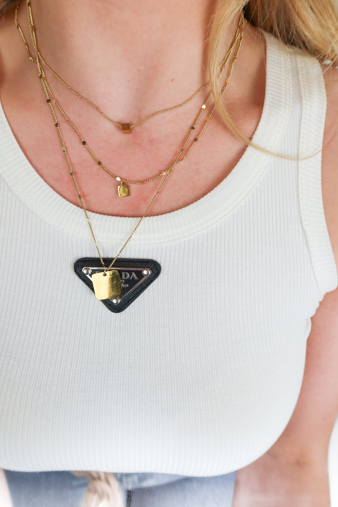 gold layered necklace with square block charms