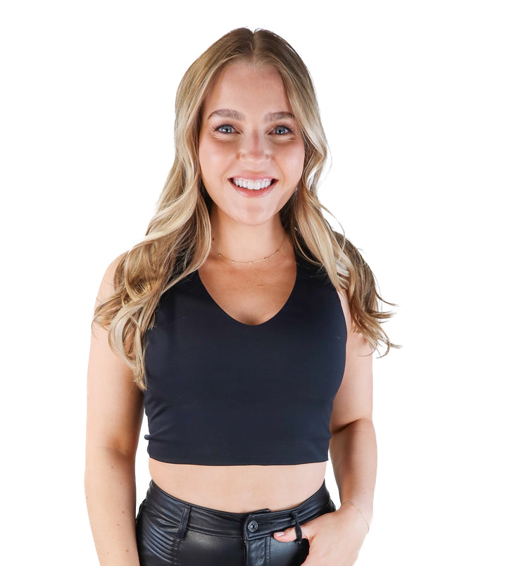 Spanx black racerback sports bra (M; retails for $78)