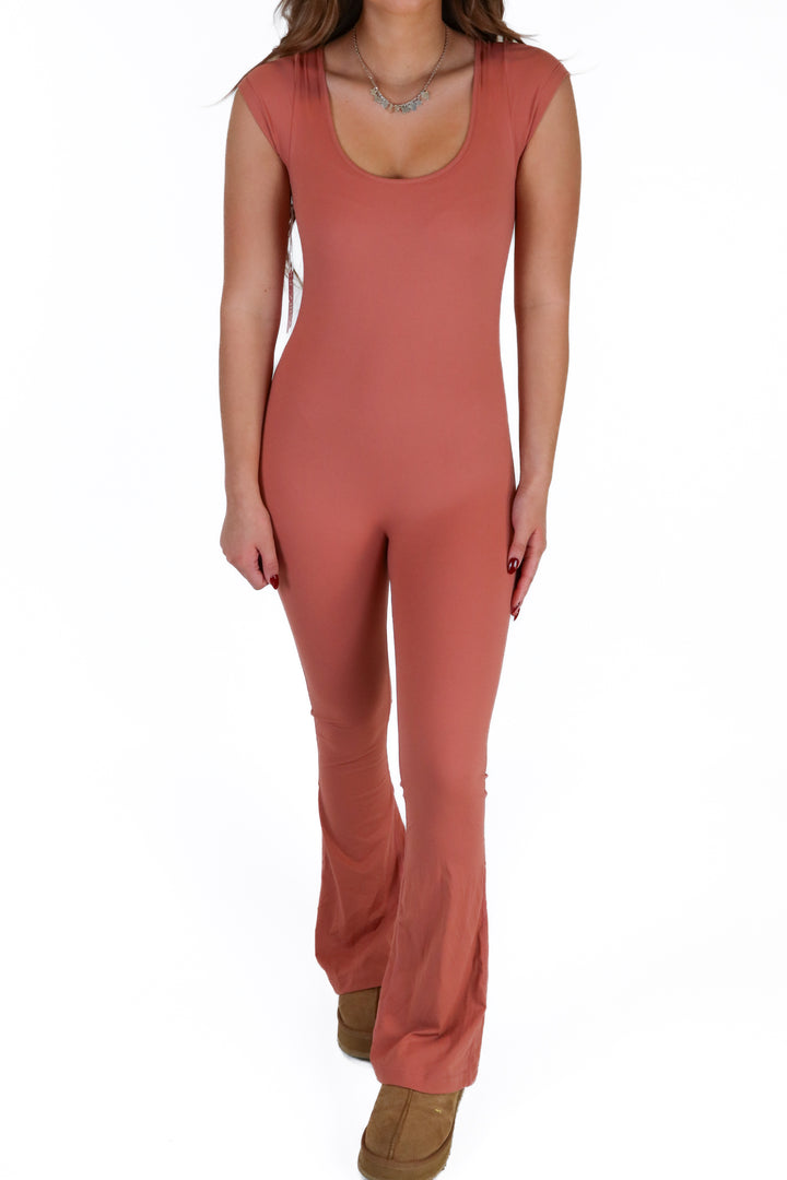 pumiey rust bodycon jumpsuit NWT (S)