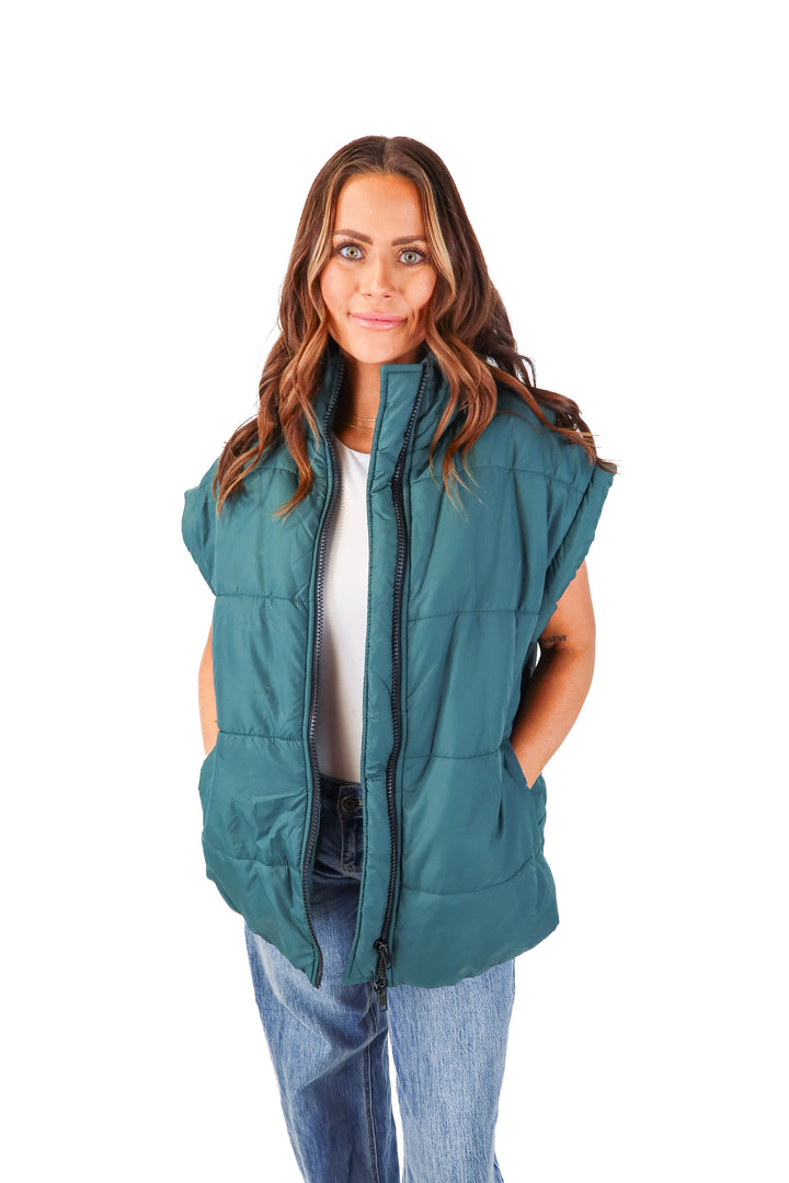 kittenish green vest (s)