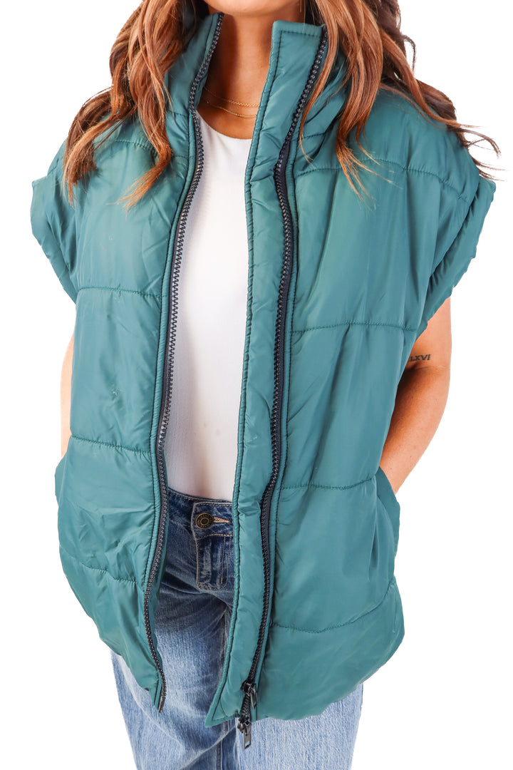 kittenish green vest (s)