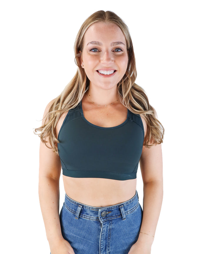 Spanx dark green criss cross sports bra (M; retails for $68)