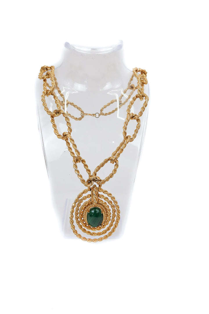 gold chunky necklace with green gem