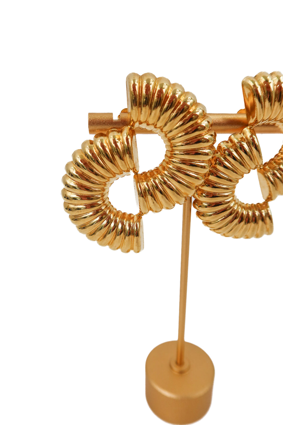 gold fan shaped earrings with spiral design