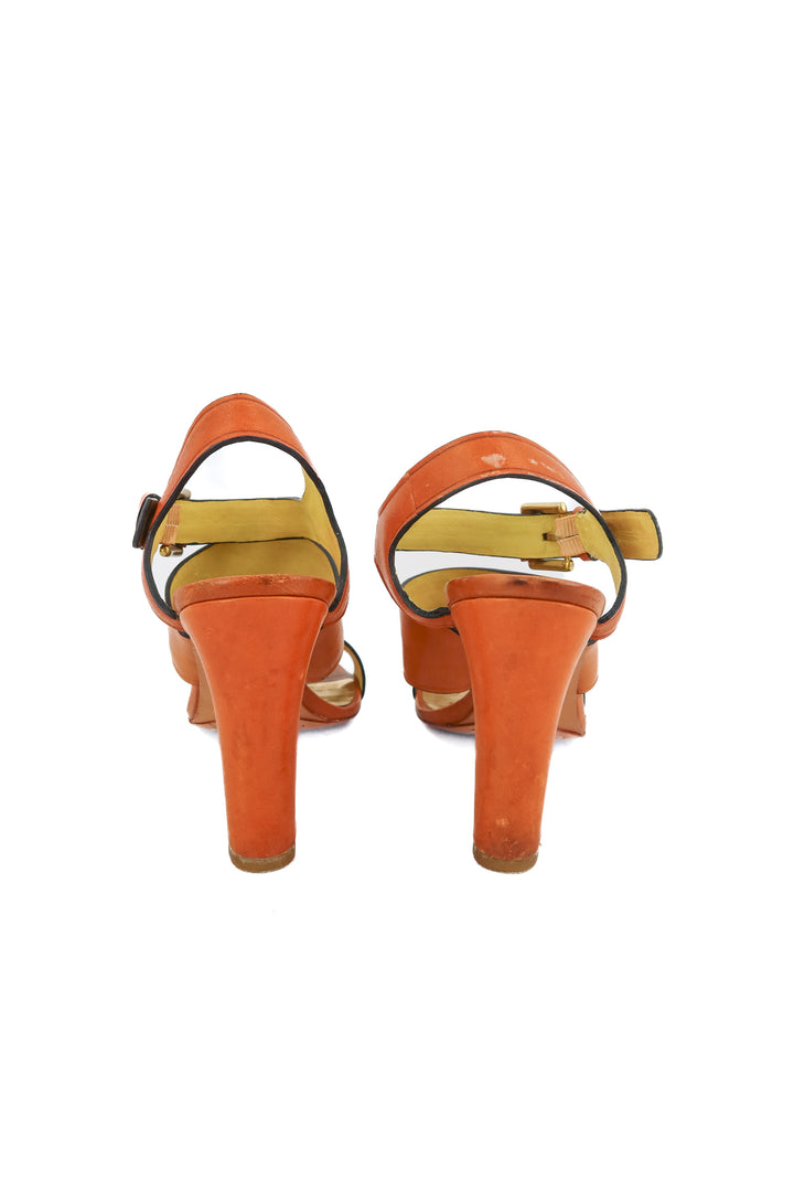 coach tan chunky heel sandals (7.5; retail $195)