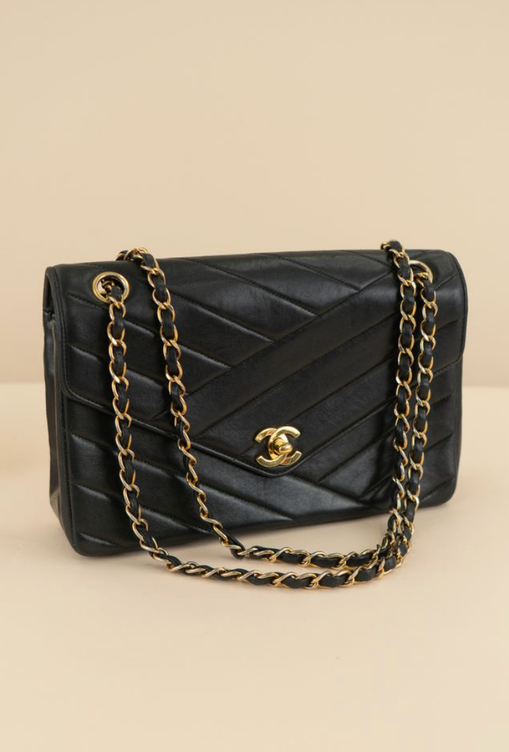 Chanel Black Lambskin Bias Quilted Shoulder Bag (vintage; typical resale $7,000)