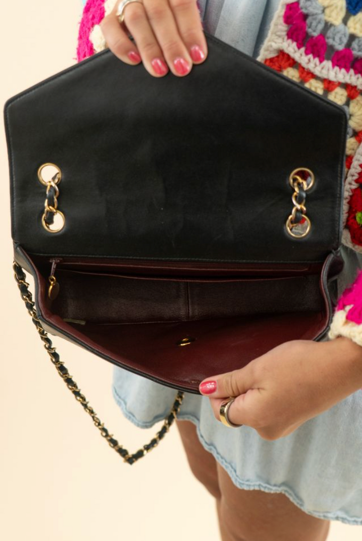 Chanel Black Lambskin Bias Quilted Shoulder Bag (vintage; typical resale $7,000)