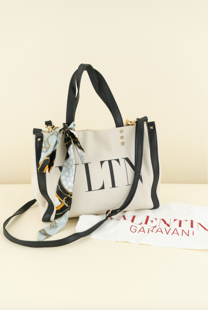 Valentino Rockstud Top Handle Bag (est. retail $2,110)