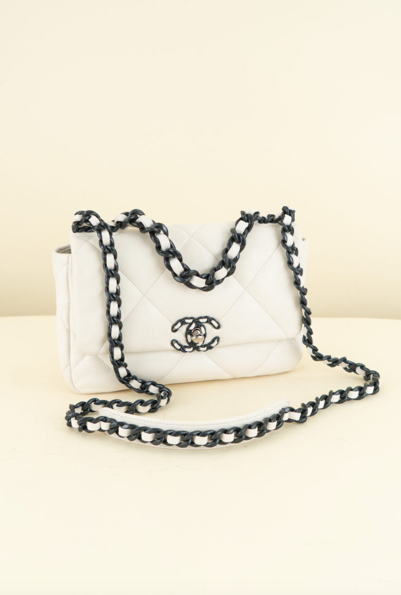 Chanel 19 limited-edition white lambskin with navy (est. retail $6,500)