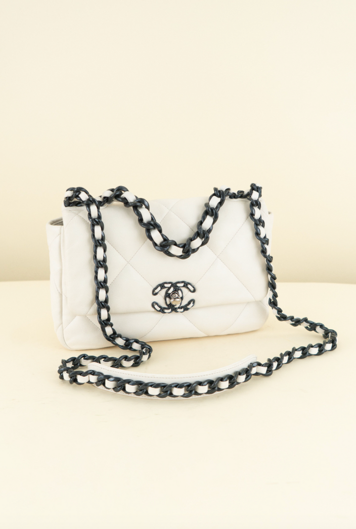 Chanel 19 limited-edition white lambskin with navy (est. retail $6,500)