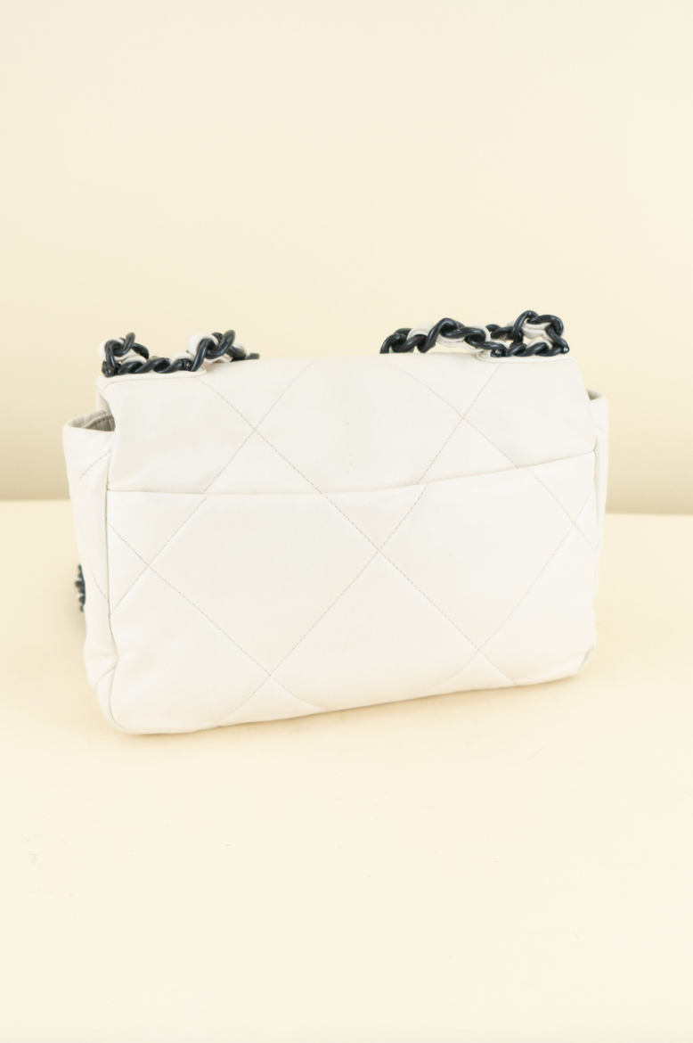 Chanel 19 limited-edition white lambskin with navy (est. retail $6,500)