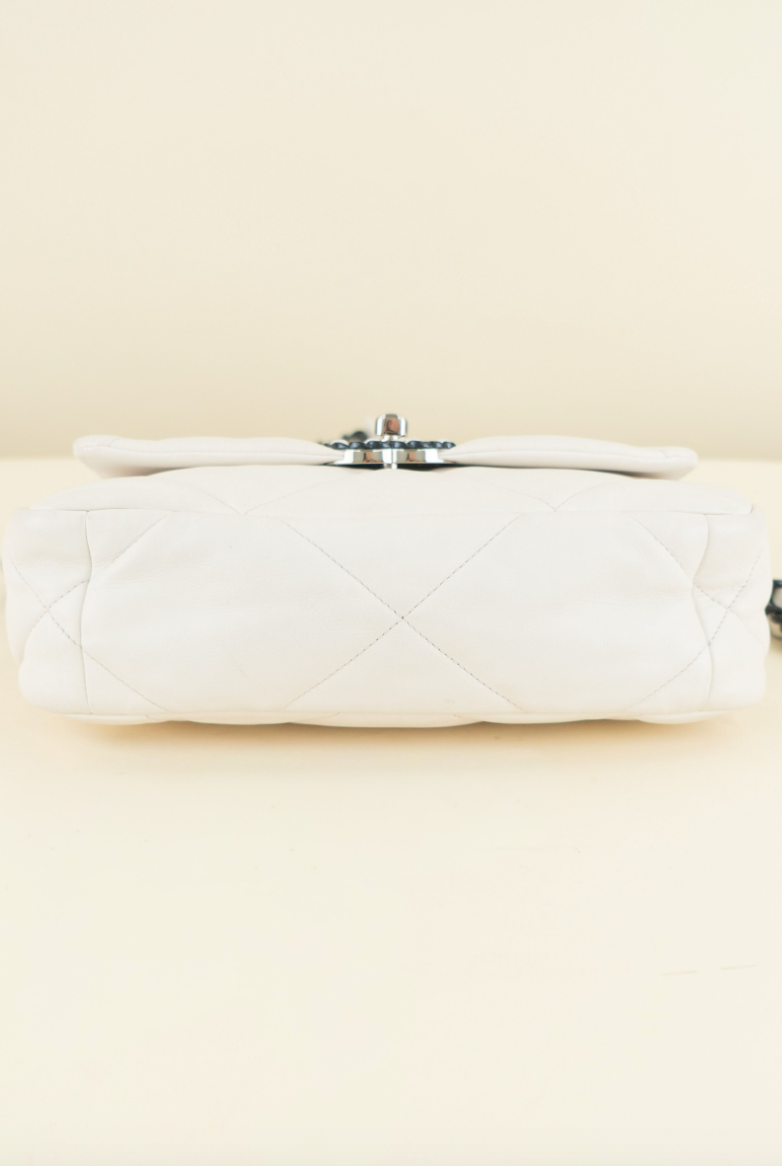 Chanel 19 limited-edition white lambskin with navy (est. retail $6,500)